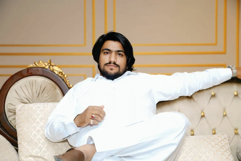 a man seeting on sofa